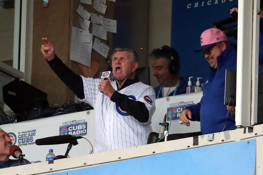 Mike Ditka sings the seventh inning stretch during the Cubs-Brewers tiebreaker game at Wrigley Field on Oct. 1, 2018.