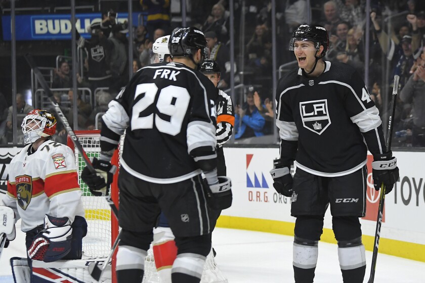 Kings right wing Martin Frk celebrates his goal with center Gabriel Vilardi, right, as Panthers goaltender Sergei Bobrovsky sits in goal during the second period of a game Feb. 20 at Staples Center.