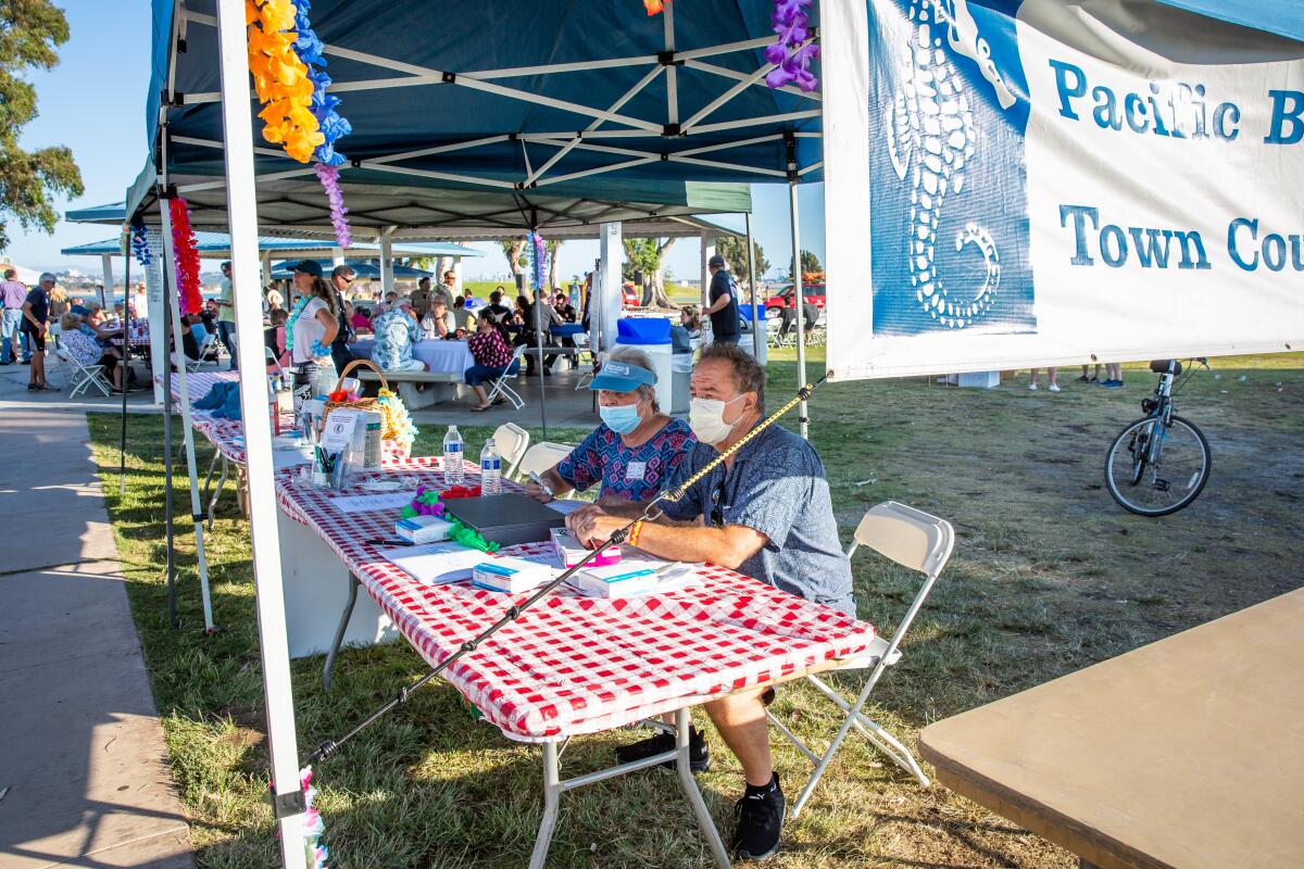 PBTC members Bob and Ellen Citrano at the booth for the PAESAN picnic.