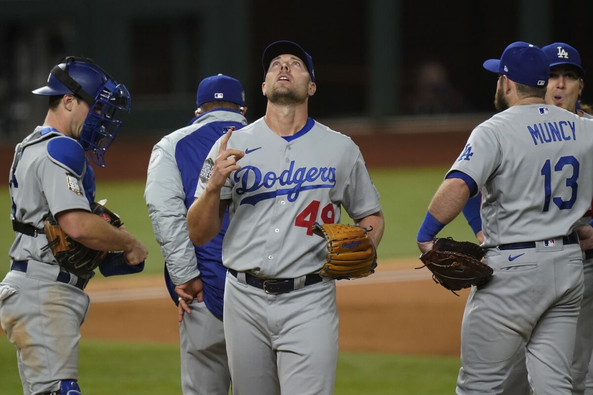 Dodgers relief pitcher Blake Treinen reacts as he leaves the game against the Tampa Bay Rays.