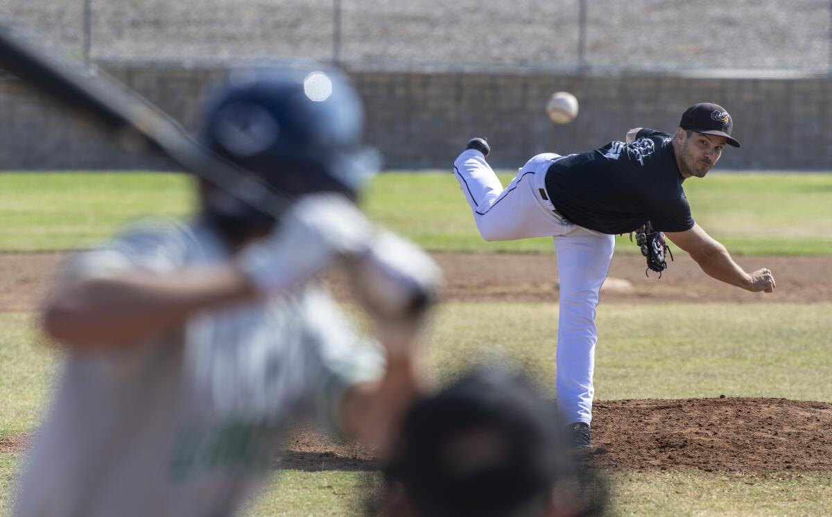 Jeff Johnson pitches during a scrimmage in Thousand Oaks to prepare for an independent league season.