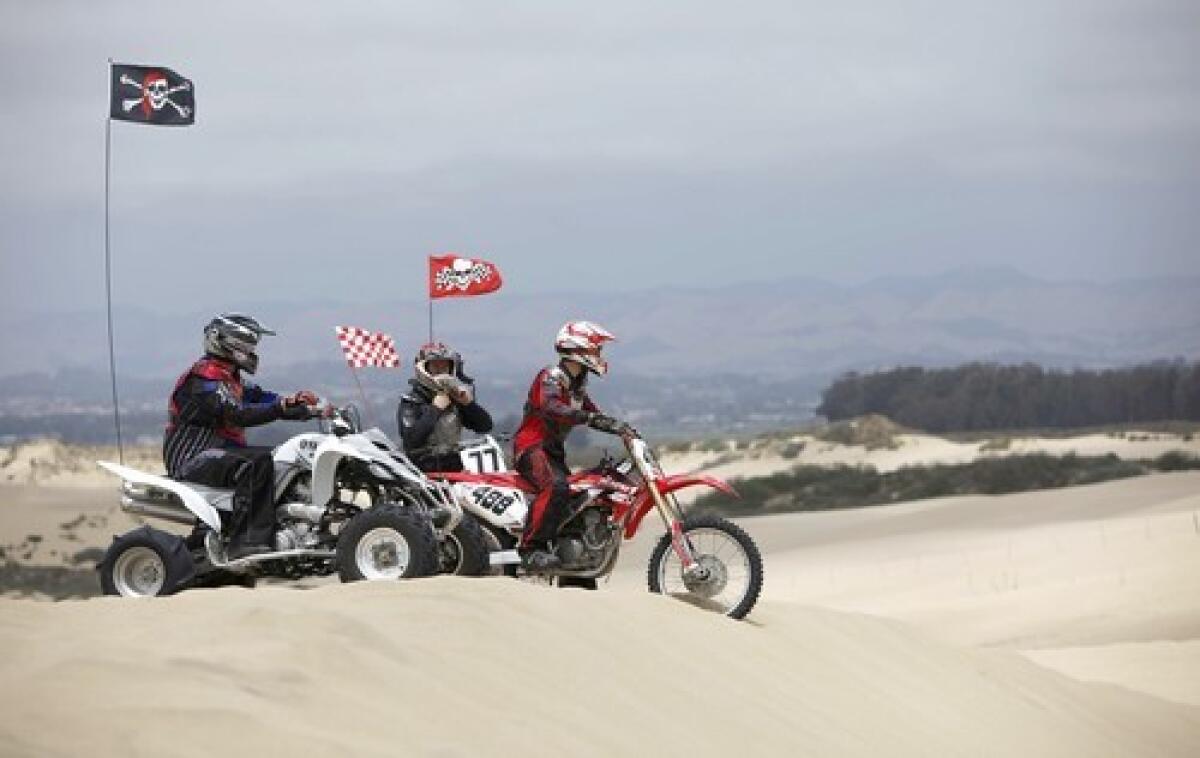 Off-roaders prepare to ride down the sand at Oceano Dunes State Vehicular Recreation Area.