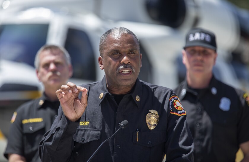 Los Angeles County Fire Chief Daryl Osby speaks during a press conference.