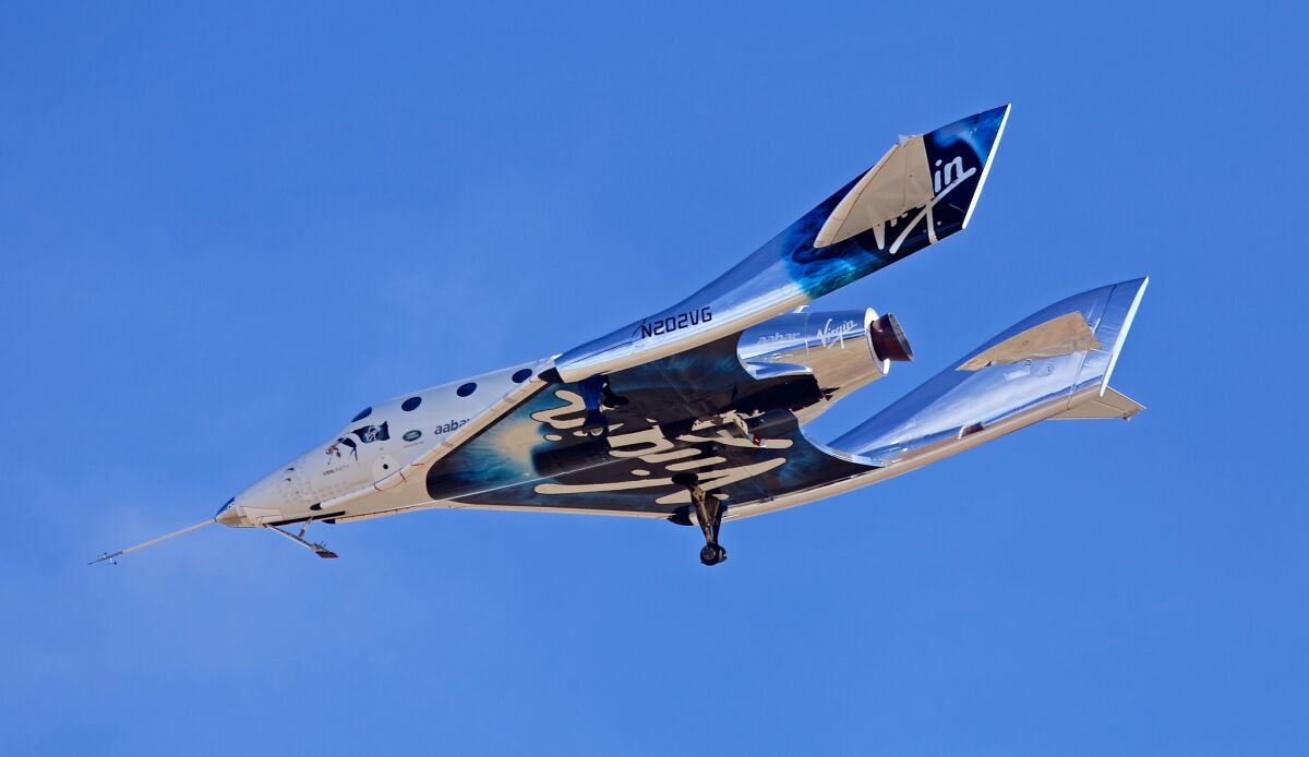 Virgin Galactic's VSS Unity spaceship completed its first rocket-powered test flight Thursday in Mojave.