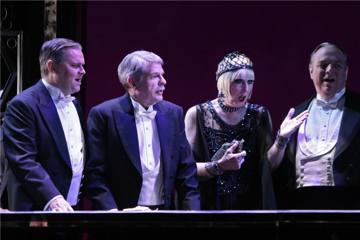 Los Angeles County Supervisor Zev Yaroslavsky, second from left, and company members in a scene from the dress rehearsal of L.A. Opera's new season opener, "La Traviata."