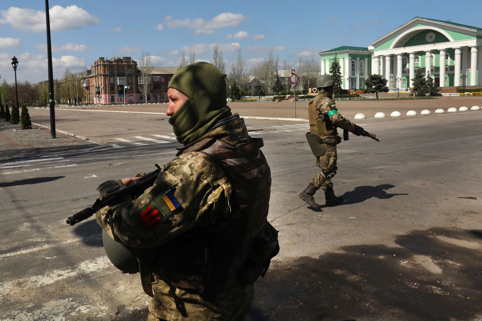 Ukrainian forces guard the city center of Severodonetsk as shelling can be heard.