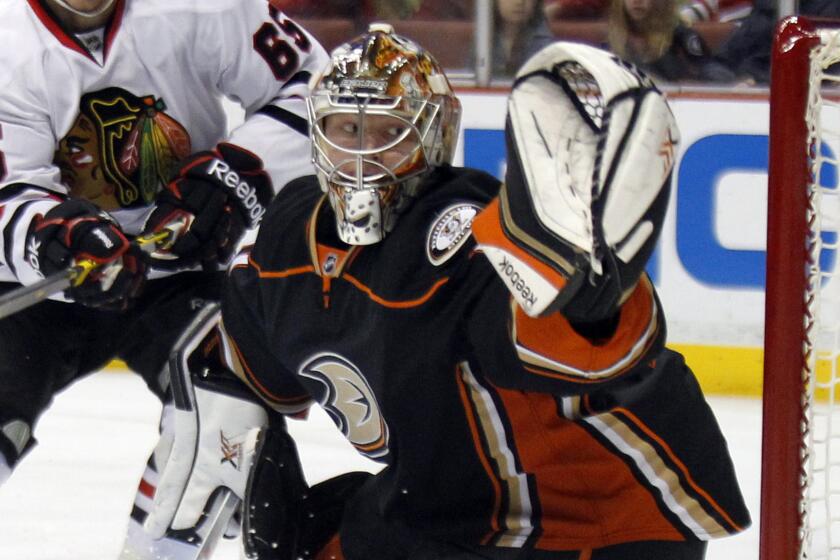 Anaheim Ducks goalie Frederik Andersen keeps his eyes on the puck during a game against the Chicago Blackhawks on Jan. 30.