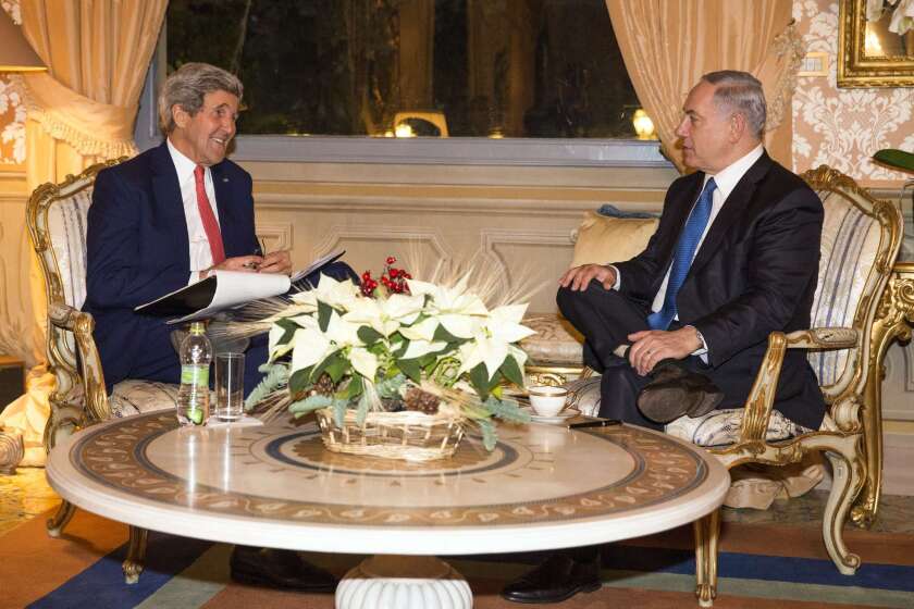 U.S. Secretary of State John F. Kerry, left, meets with Israel Prime Minister Benjamin Netanyahu in Rome on Dec. 15.