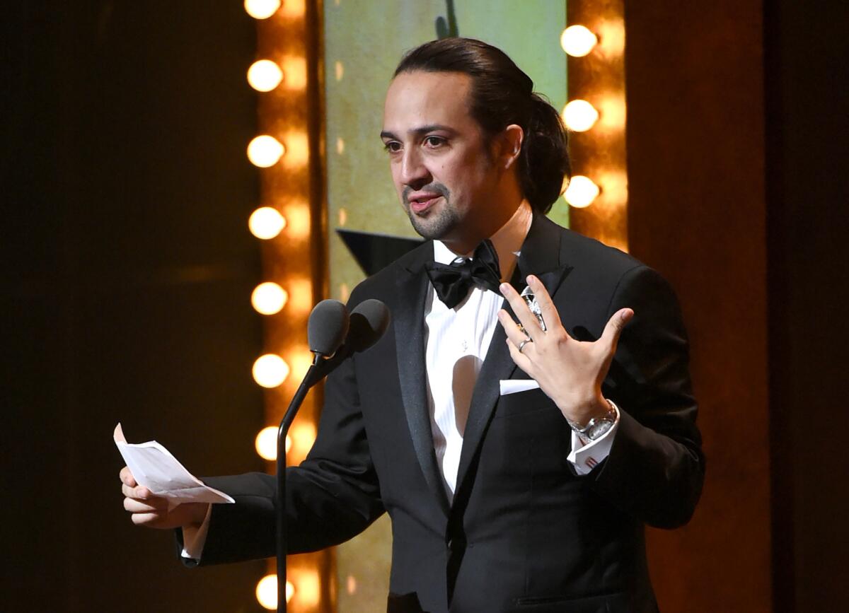 Lin-Manuel Miranda accepts the award for best original score for "Hamilton" at the Tony Awards on June 12 in New York.