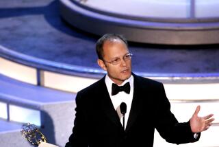 David Hyde Pierce accepts his award for Supporting Actor in a Comedy Series at the 56th Annual Primetime Emmy Awards