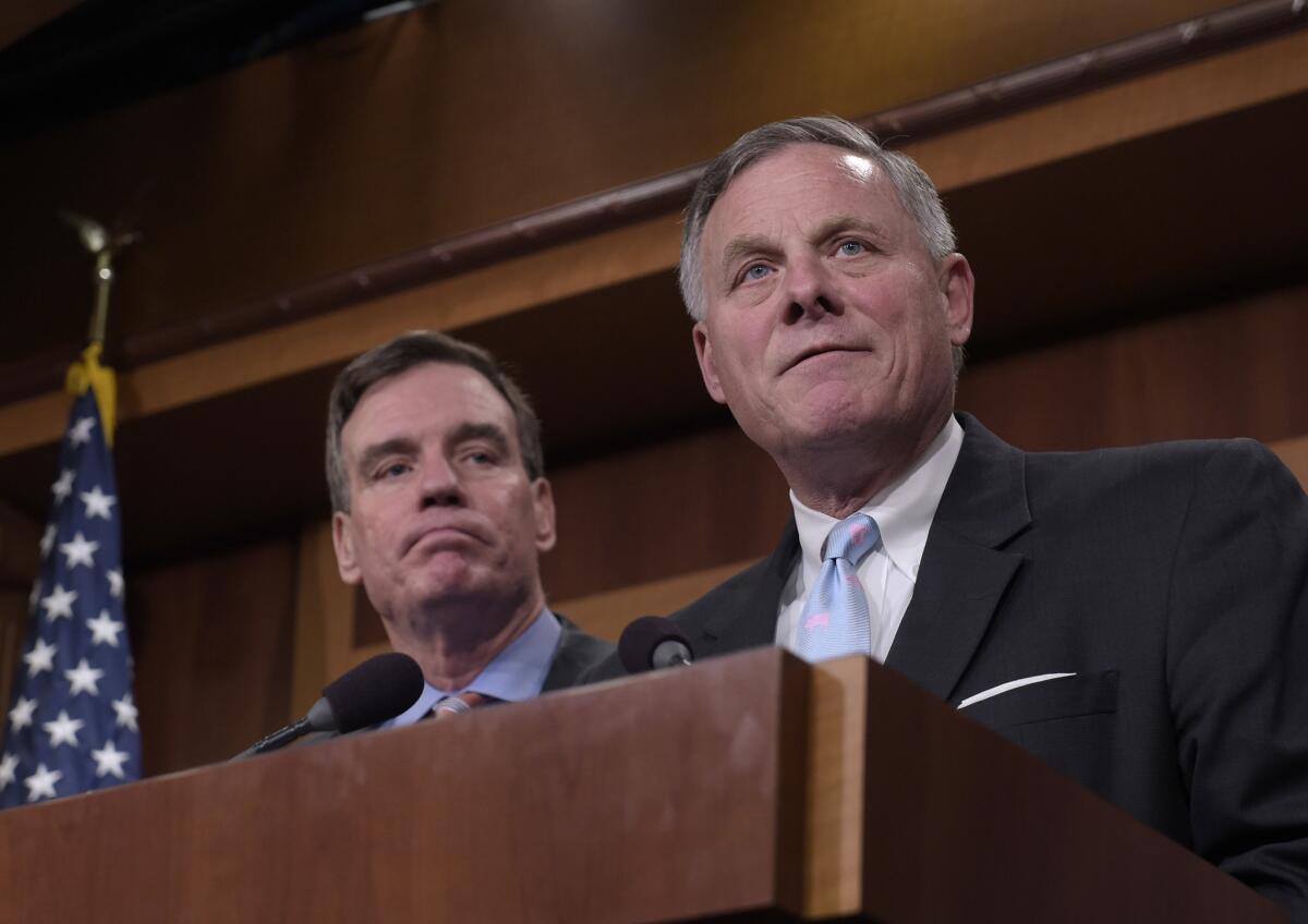 Senate Intelligence Committee Chairman Richard M. Burr (R-N.C.), right, is seeking to retrieve all copies of the 6,700-page classified torture report.