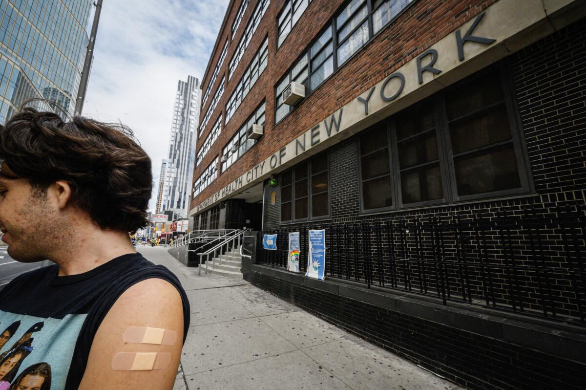 A man who received a polio vaccination outside a health clinic in Brooklyn, N.Y.
