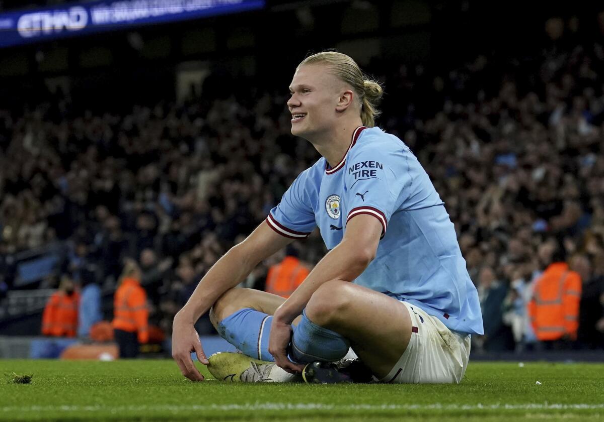 Manchester City's Erling Haaland celebrates after scoring his side's second goal during the English Premier League soccer match between Manchester City and West Ham United at Etihad stadium in Manchester, England, Wednesday, May 3, 2023. (Martin Rickett/PA via AP)