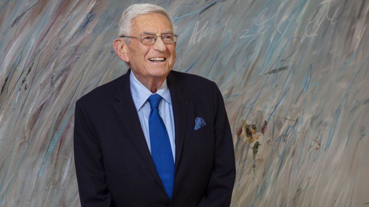 Eli Broad stands in front of a Cy Twombly painting, part of Broad's vast art collection, at his Los Angeles home in April.
