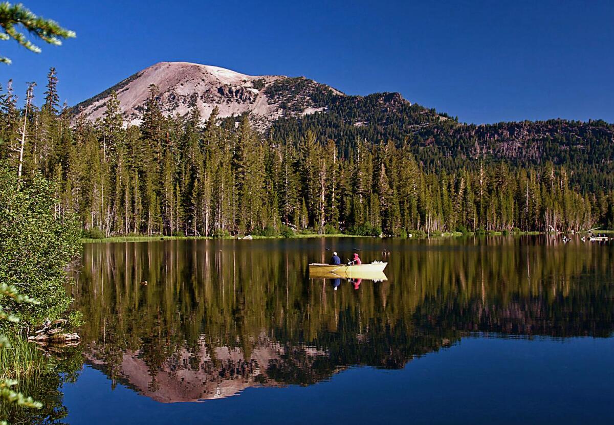 Mammoth Lakes are the surrounded area is a population destination for angles like these fisherman in a boat.