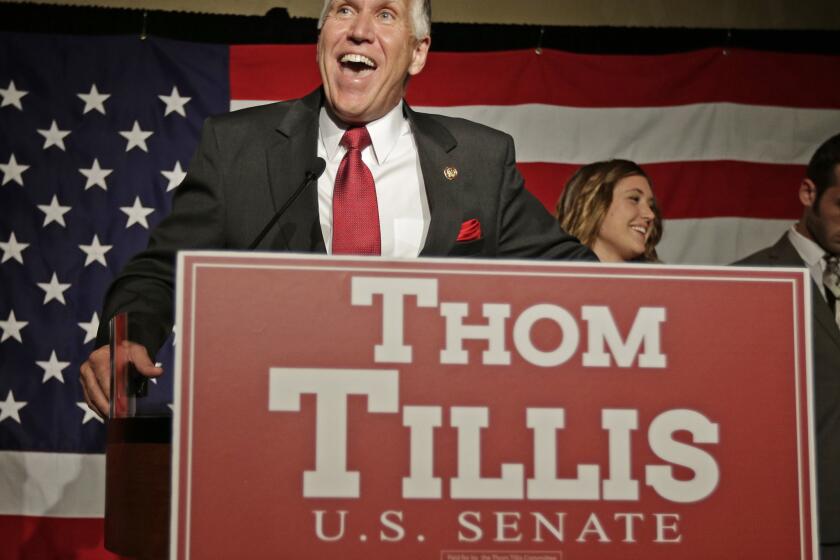 Thom Tillis speaks to supporters at an election night rally in Charlotte, N.C., after winning the Republican nomination for the U.S. Senate.