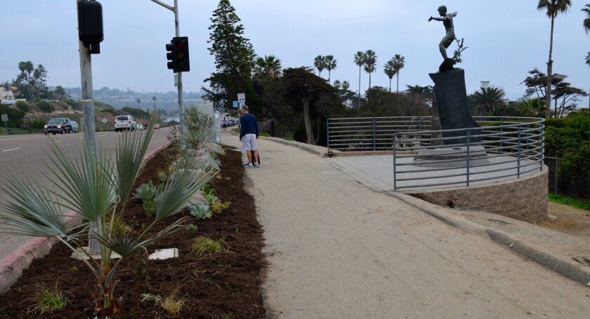 New landscaping borders the Cardiff Kook statue.