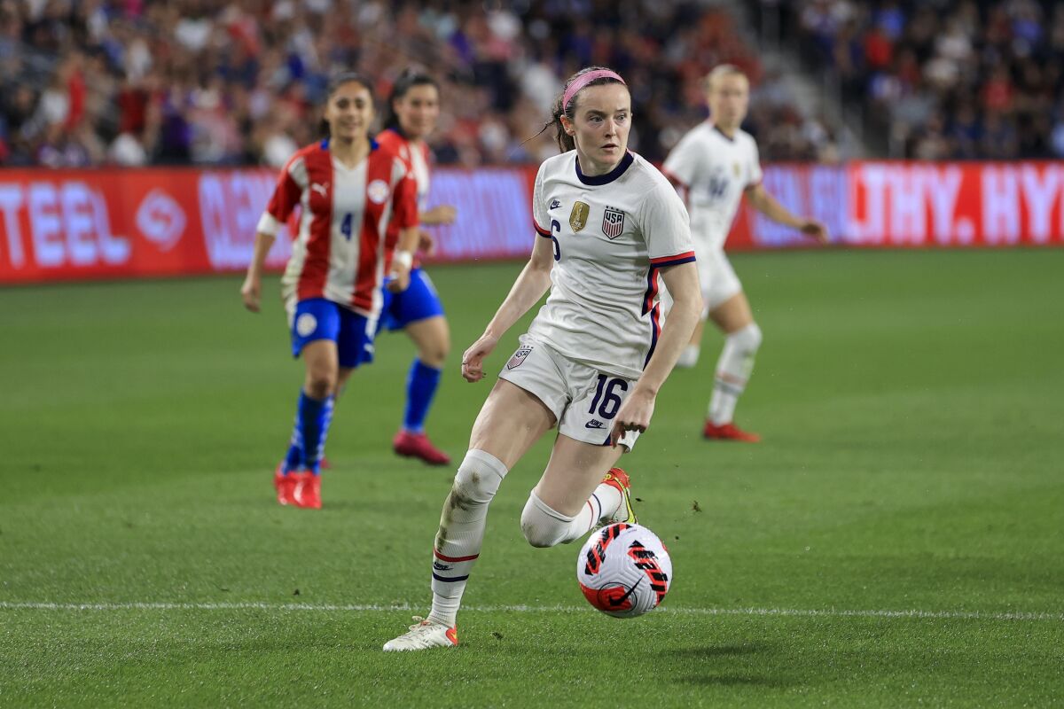 FILE - United States midfielder Rose Lavelle (16) plays during an international friendly soccer match against Paraguay, Tuesday, Sept. 21, 2021, in Cincinnati. The U.S. women’s national soccer team will play Iceland, New Zealand and the Czech Republic in the SheBelieves Cup tournament next month. The seventh annual event will be played Feb. 17 to Feb. 23 at venues in Carson, California, and Frisco, Texas. (AP Photo/Aaron Doster, File)