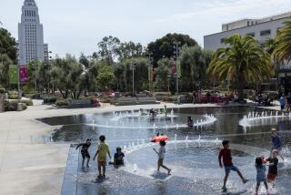 LOS ANGELES, CA - SEPTEMBER 07: The Arthur J. Will Memorial Fountain at Grand Park in Los Angeles, CA provided a cool spot for youngsters celebrating a friend's birthday party on Saturday, Sept. 7, 2024. (Myung J. Chun / Los Angeles Times)