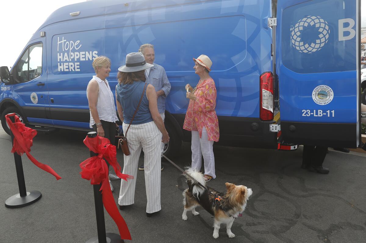 The Be Well OC van at a ribbon-cutting ceremony at Main Beach in Laguna Beach on Tuesday.