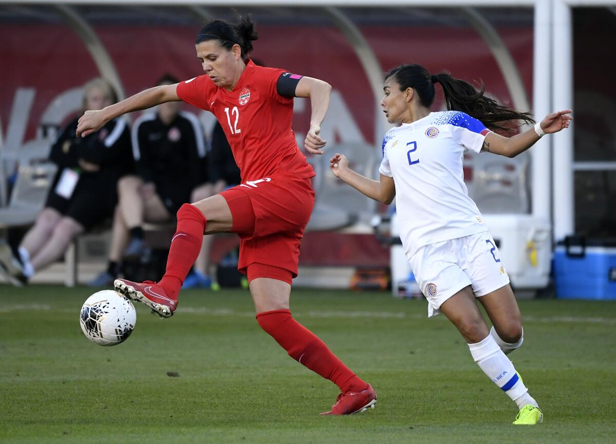 Canada's Christine Sinclair controls the ball against Costa Rica's Gabriela Guillen during Canada's 1-0 win Feb. 8, 2020, in Carson.