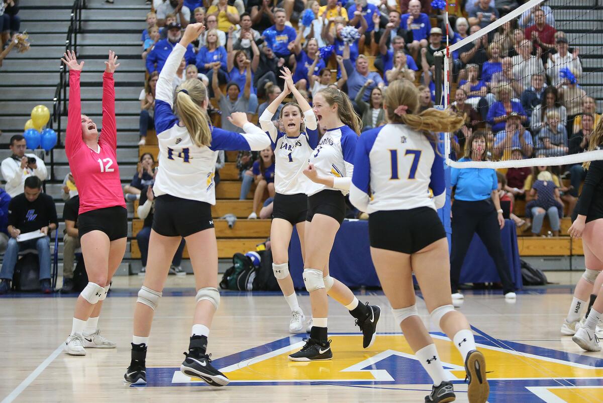 Fountain Valley players celebrate in Game 3 of the CIF Southern Section Division 3 quarterfinals against Paloma Valley on Wednesday.