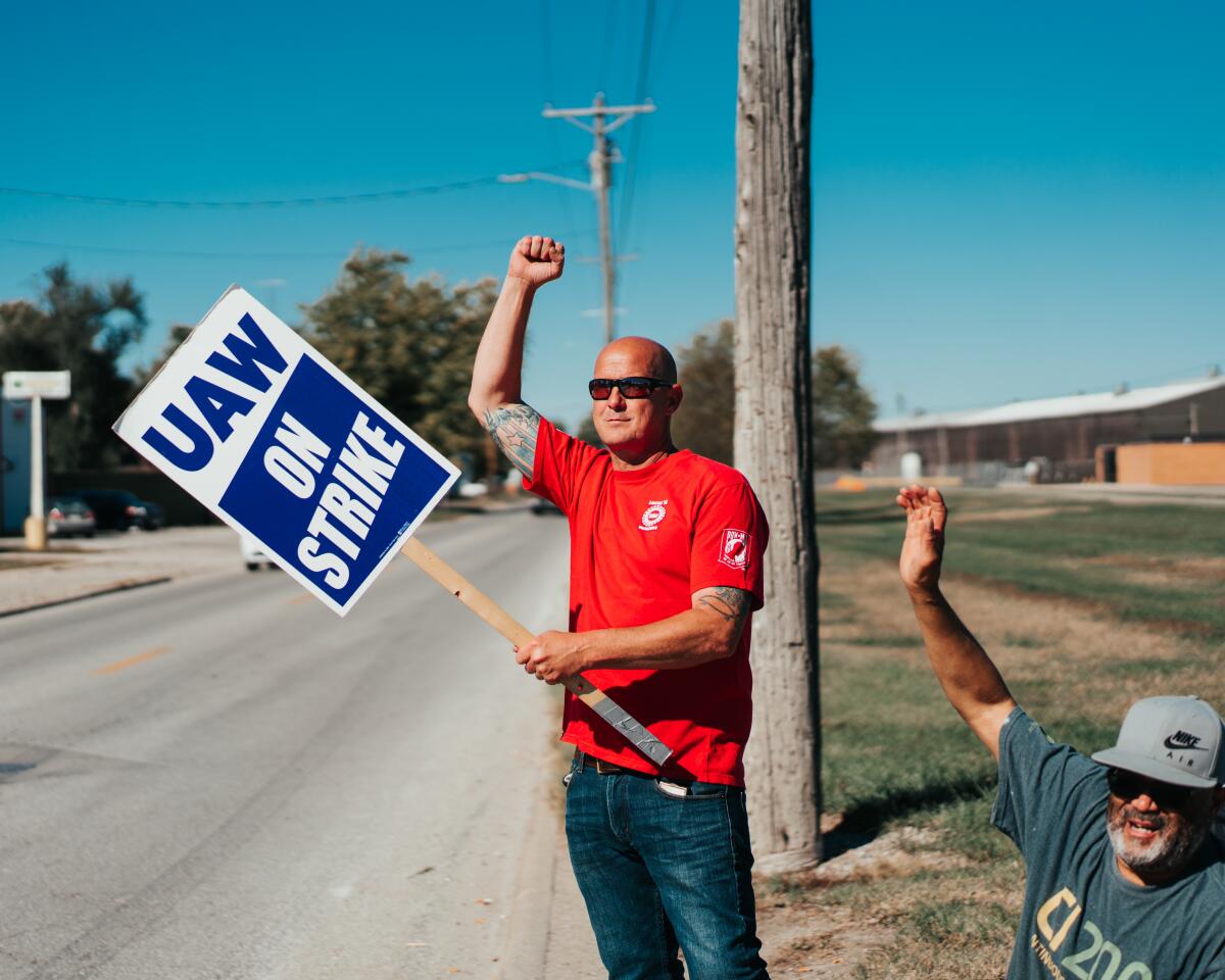 Chris Laursen stands on the picket line in Ottumwa, Iowa.