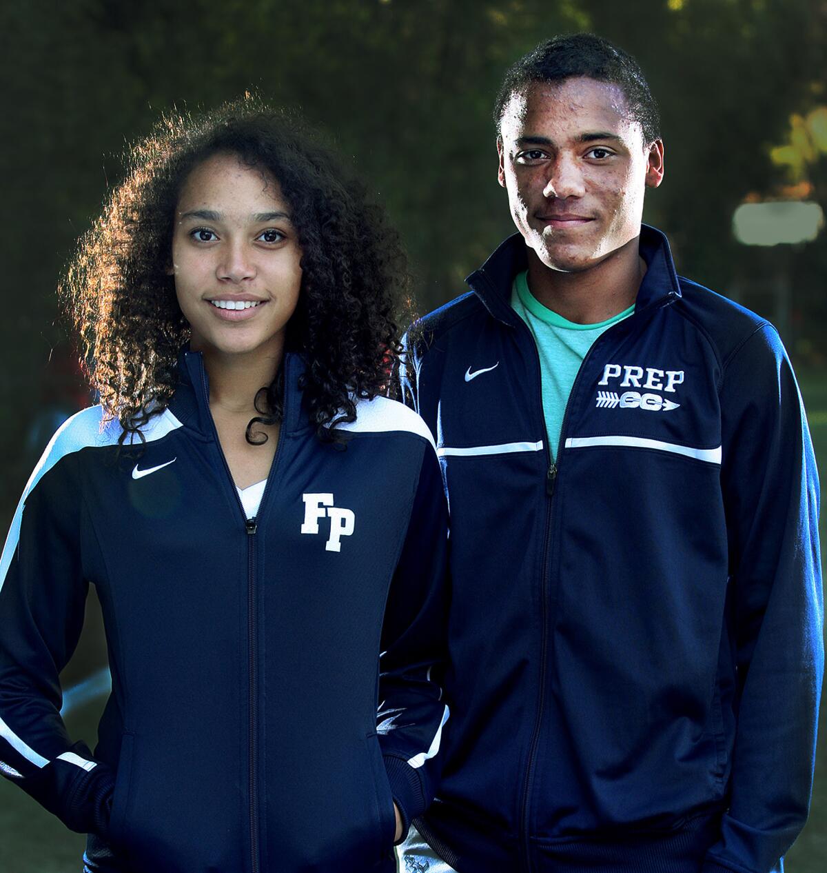 Sister and brother star runners Sarah and Alan Yoho, of Flintridge Prep cross country, on Monday, Nov. 25, 2013.