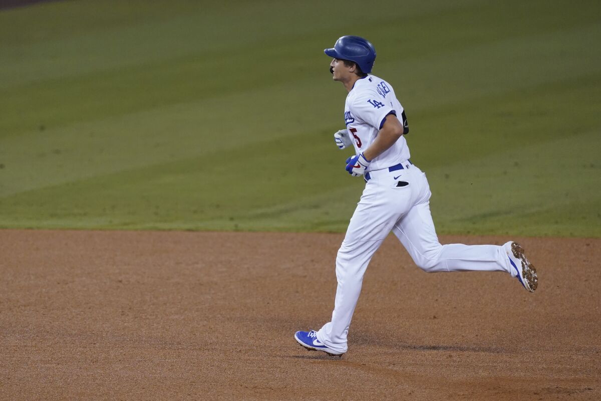 Dodgers shortstop Corey Seager rounds the bases after hitting a solo home run in Game 1 on Wednesday.