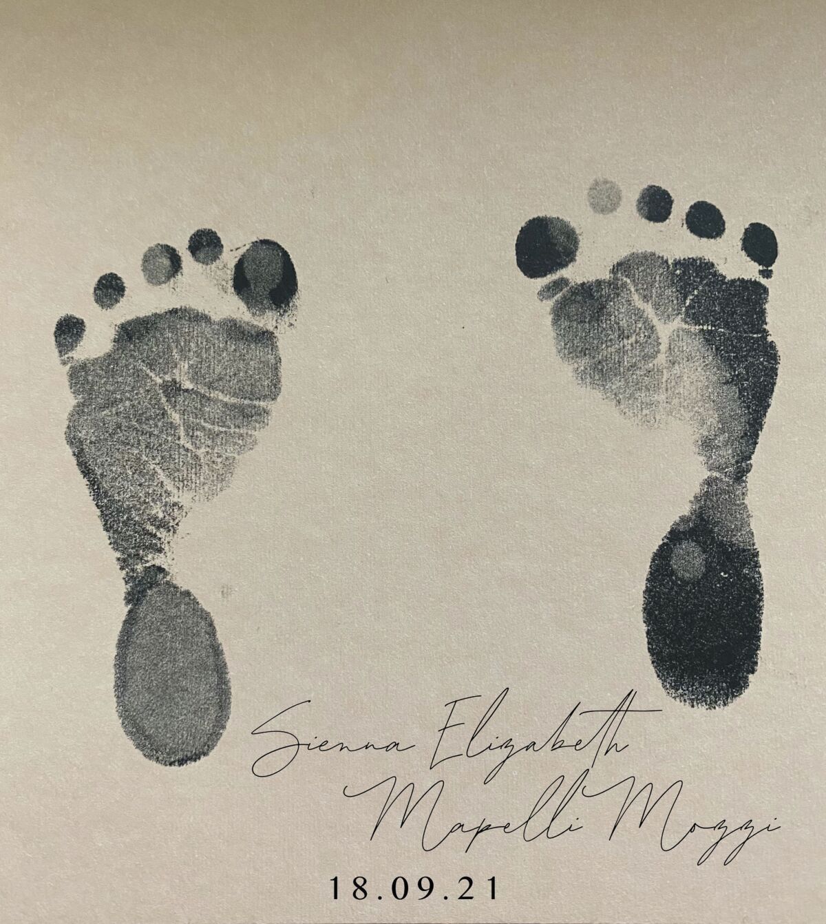 This undated handout photo provided by Buckingham Palace on Friday, Oct. 1, 2021 shows the footprint and name of the daughter of Britain's Princess Beatrice. Princess Beatrice and her husband Edoardo Mapelli Mozzi have named their newborn daughter Sienna Elizabeth. In a tweet Friday, Beatrice revealed the name alongside a picture of Sienna Elizabeth’s footprints. (Princess Beatrice and Edoardo Mapelli Mozzi/Buckingham Palace via AP)