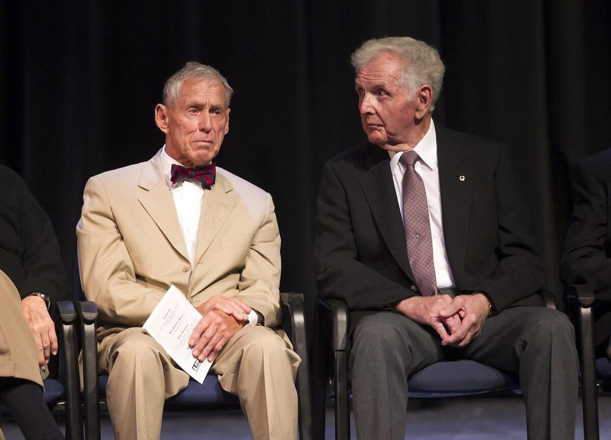 Inductees David Grant, class of 1956, left, and Roger Neth, class of 1944, attend the Newport Harbor High School Alumni Assn.’s third annual Hall of Fame induction ceremony on Wednesday at the school.