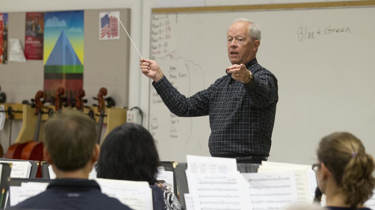 Conductor Tom Ridley during a Huntington Beach Concert Band rehearsal at Marina High School in 2016.