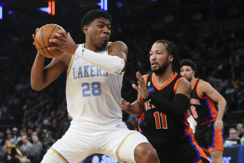 New York Knicks' Jalen Brunson (11) defends Los Angeles Lakers' Rui Hachimura (28), of Japan, during the second half of an NBA basketball game Tuesday, Jan. 31, 2023, in New York. (AP Photo/Frank Franklin II)