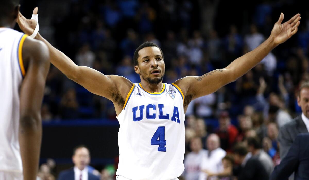 UCLA guard Norman Powell celebrates the Bruins' 69-59 victory over Utah on Thursday night at Pauley Pavilion.