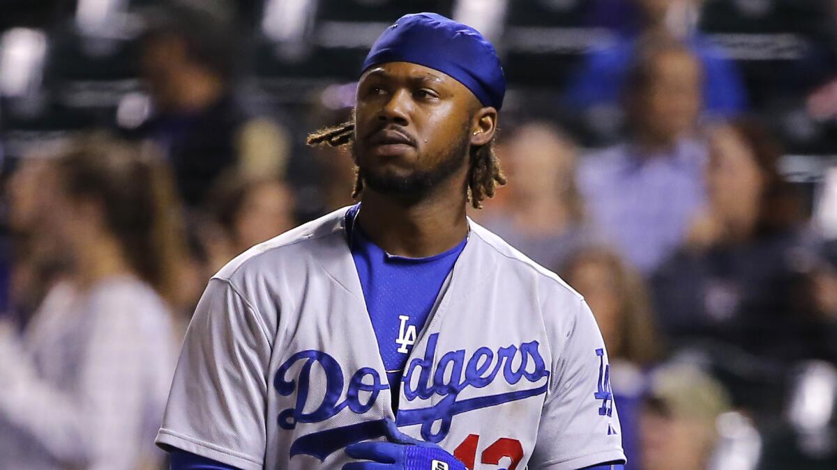 Dodgers shortstop Hanley Ramirez reacts after striking out Monday against the Colorado Rockies.