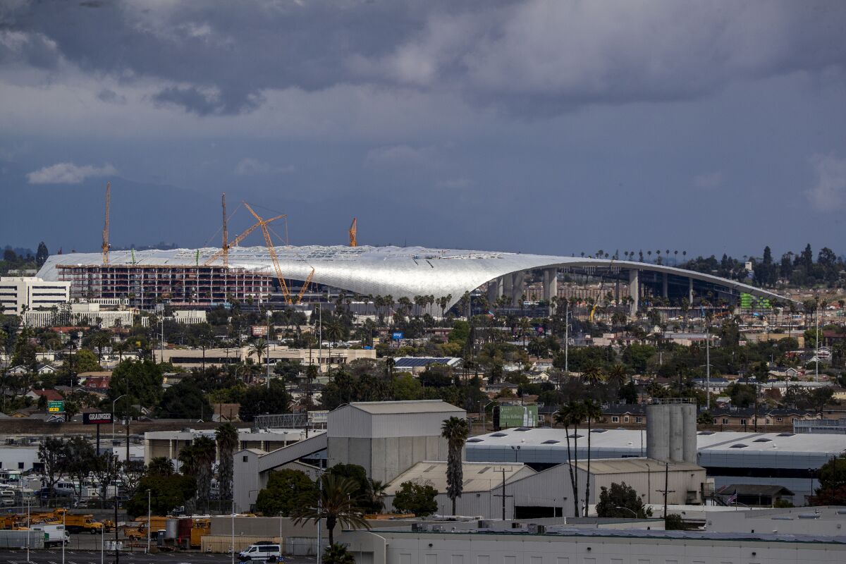 An aerial view of SoFi Stadium under construction in Inglewood.