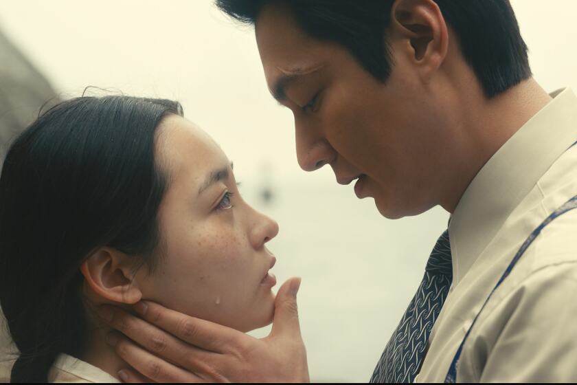 Minha Kim (left) and Lee Min-ho costar in "Pachinko," a multigenerational epic streaming on Apple TV+.