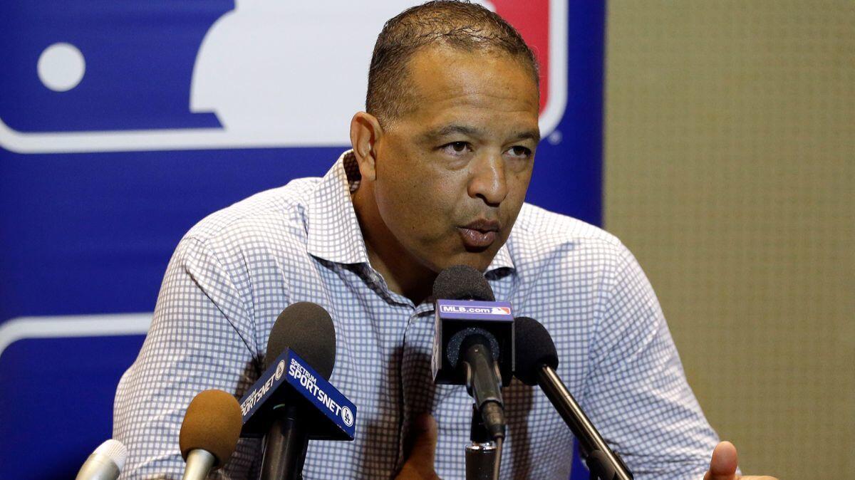 Dodgers manager Dave Roberts fields media questions Tuesday at the MLB baseball winter meetings in Orlando, Fla.