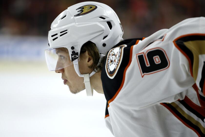 Ducks center Rickard Rakell gets set for a faceoff during a game against the Flyers.