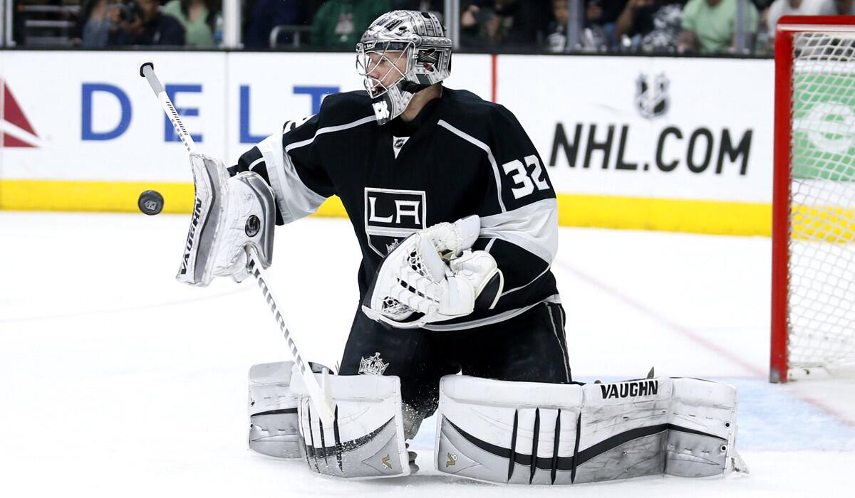 Los Angeles Kings goalie Jonathan Quick makes a save against the Arizona Coyotes during the first period on Monday. Kings won, 1-0.