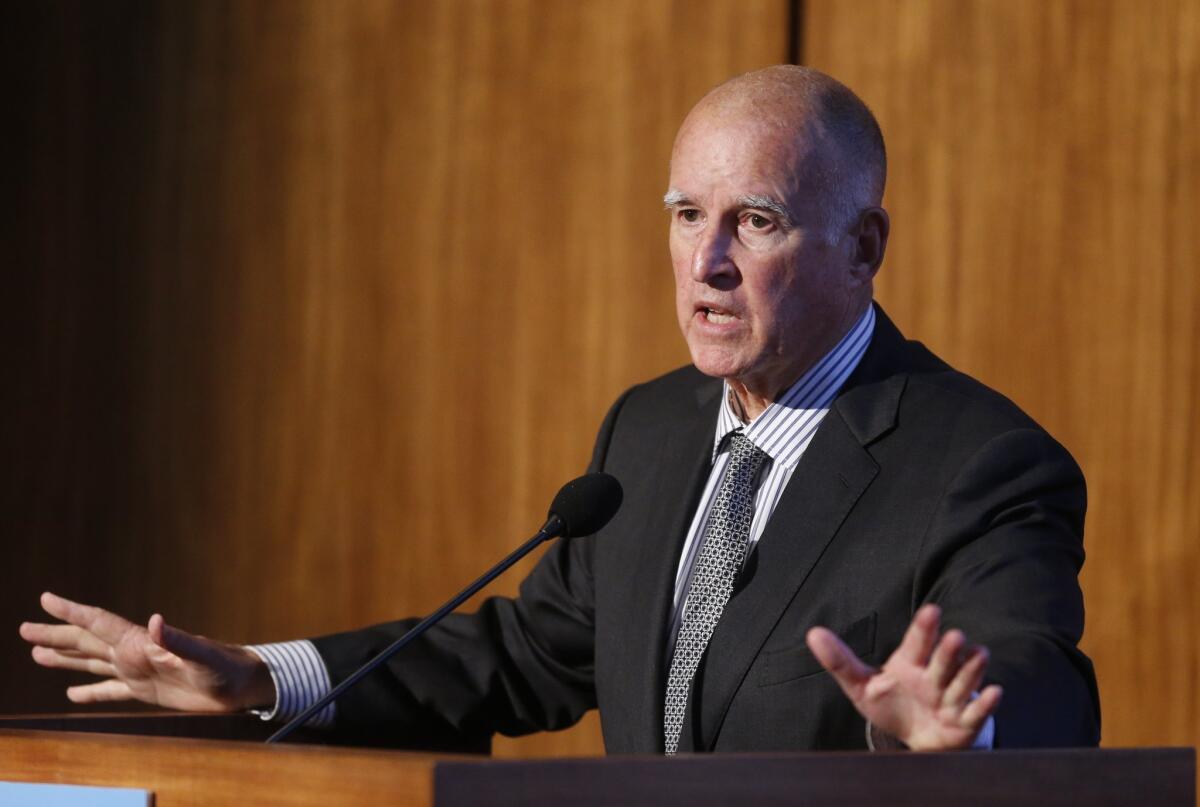 California Gov. Jerry Brown speaks at the Carbon Neutrality Initiative at UC San Diego on Tuesday. At the two-day climate change summit at UC San Diego, researchers are discussing their blueprint for concrete action that the state and the world should take to tackle the problem.