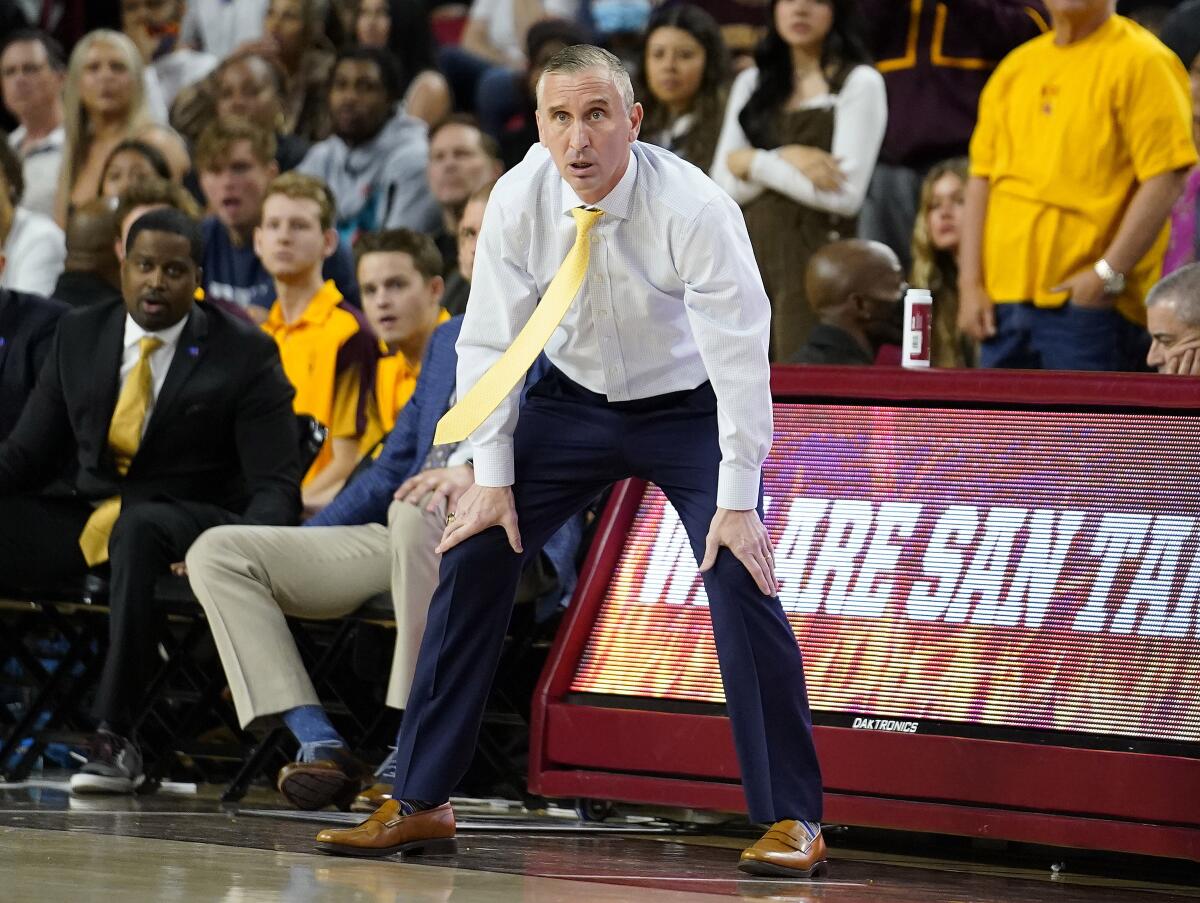 FILE - Arizona State head coach Bobby Hurley watches during an NCAA college basketball game against Stanford, Saturday, March 5, 2022, in Tempe, Ariz. Hurley had built Arizona State into a contender, taking the program to the cusp of a third straight NCAA Tournament in 2020. The pandemic cut that bid short and the Sun Devils haven't been the same since. That could change this season, a pivotal one for Hurley's tenure in the desert.(AP Photo/Darryl Webb, File)