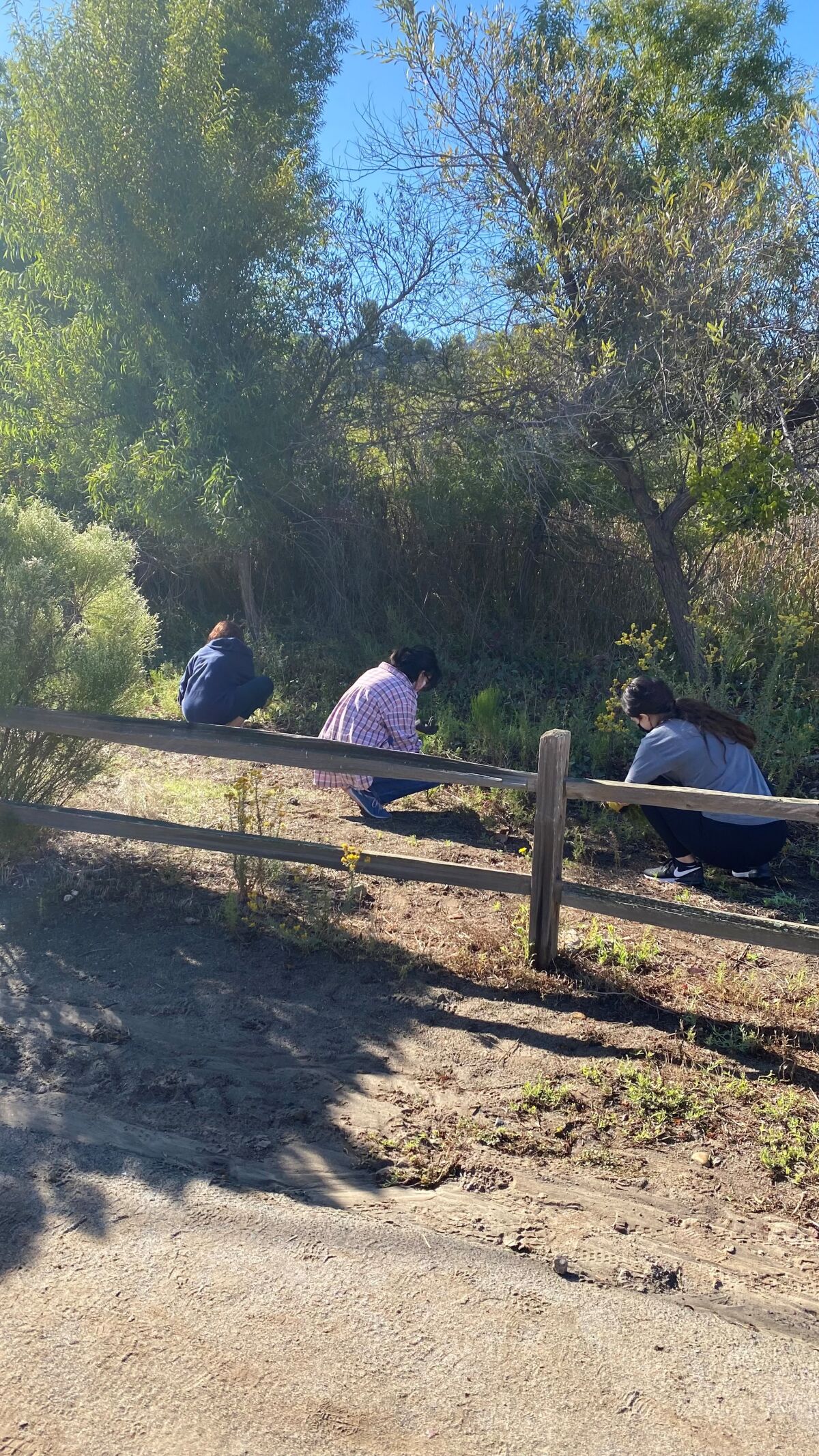 CCA and PTMS JOI Club members working on a Community Week 2021 conservation project.