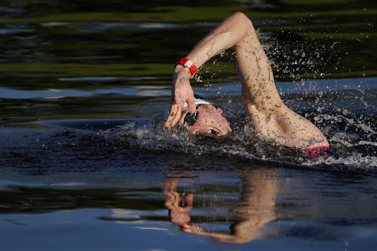 Florian Wellbrock, of Germany, competes in the men's marathon swimming event at the 2020 Summer Olympics, Thursday, Aug. 5, 2021, in Tokyo, Japan. (AP Photo/Jae C. Hong)