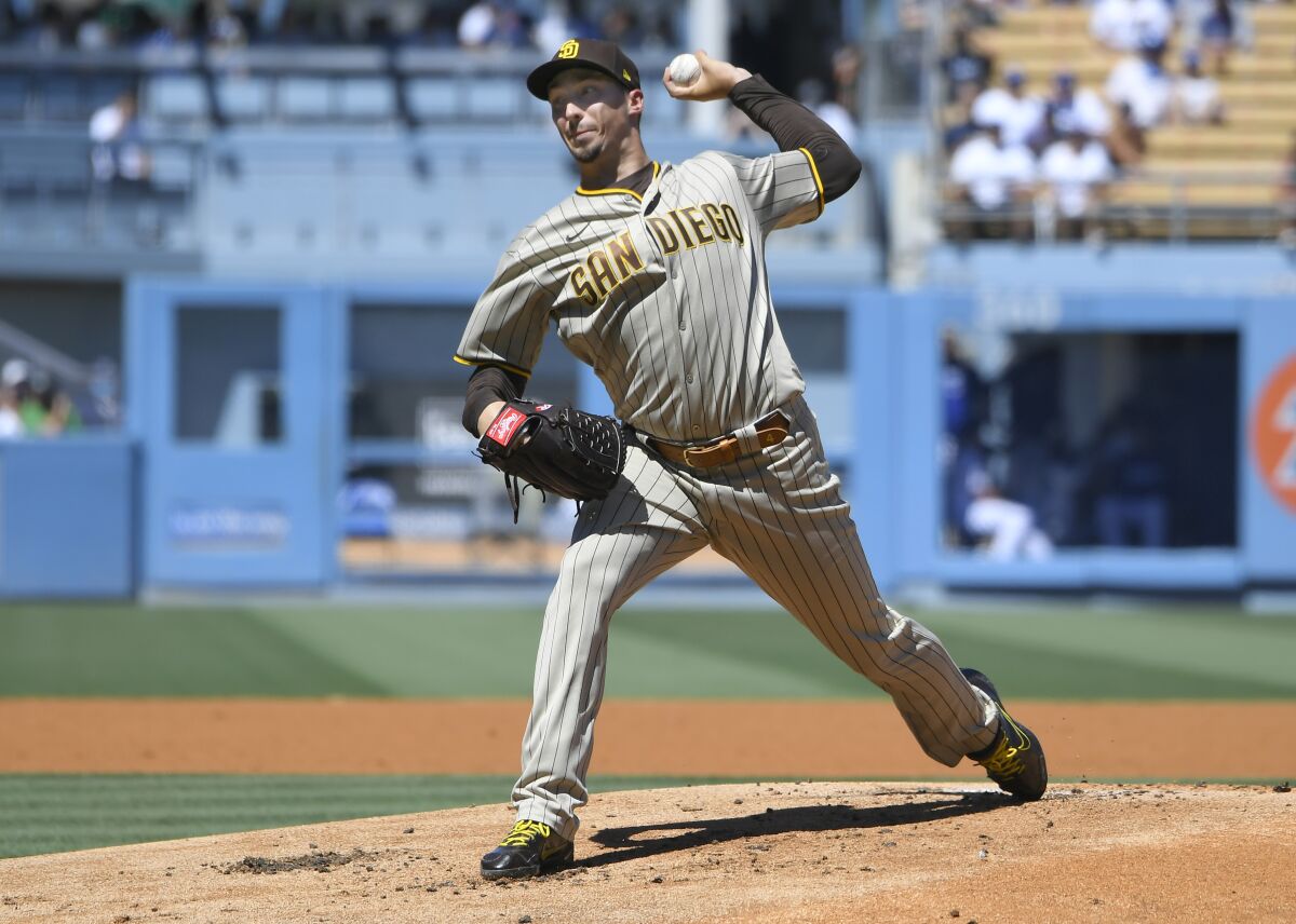 San Diego Padres starting pitcher Blake Snell throws in the first inning against the Los Angeles Dodgers during a baseball game Sunday, Sept. 12, 2021, in Los Angeles, Calif. (AP Photo/John McCoy)