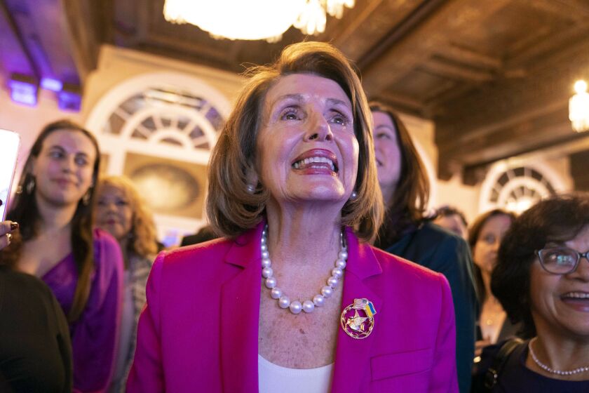 WASHINGTON, DC - MARCH 9, 2023: Nancy Pelosi (D-CA) smiles while watching Grateful Dead's Mickey Hart speak in a tribute video during an event called "Thank You, Madam Speaker" put on by MomsRising Together, National Women's Law Center, SEIU, Paid Leave for All, National Domestic Worker's Alliance, Ultraviolet, Planned Parenthood, and National Partnership for Women and Families at The Regis Hotel in Washington, DC on Thursday, March 9, 2023 in Washington, DC. (Bonnie Cash / For The Times)