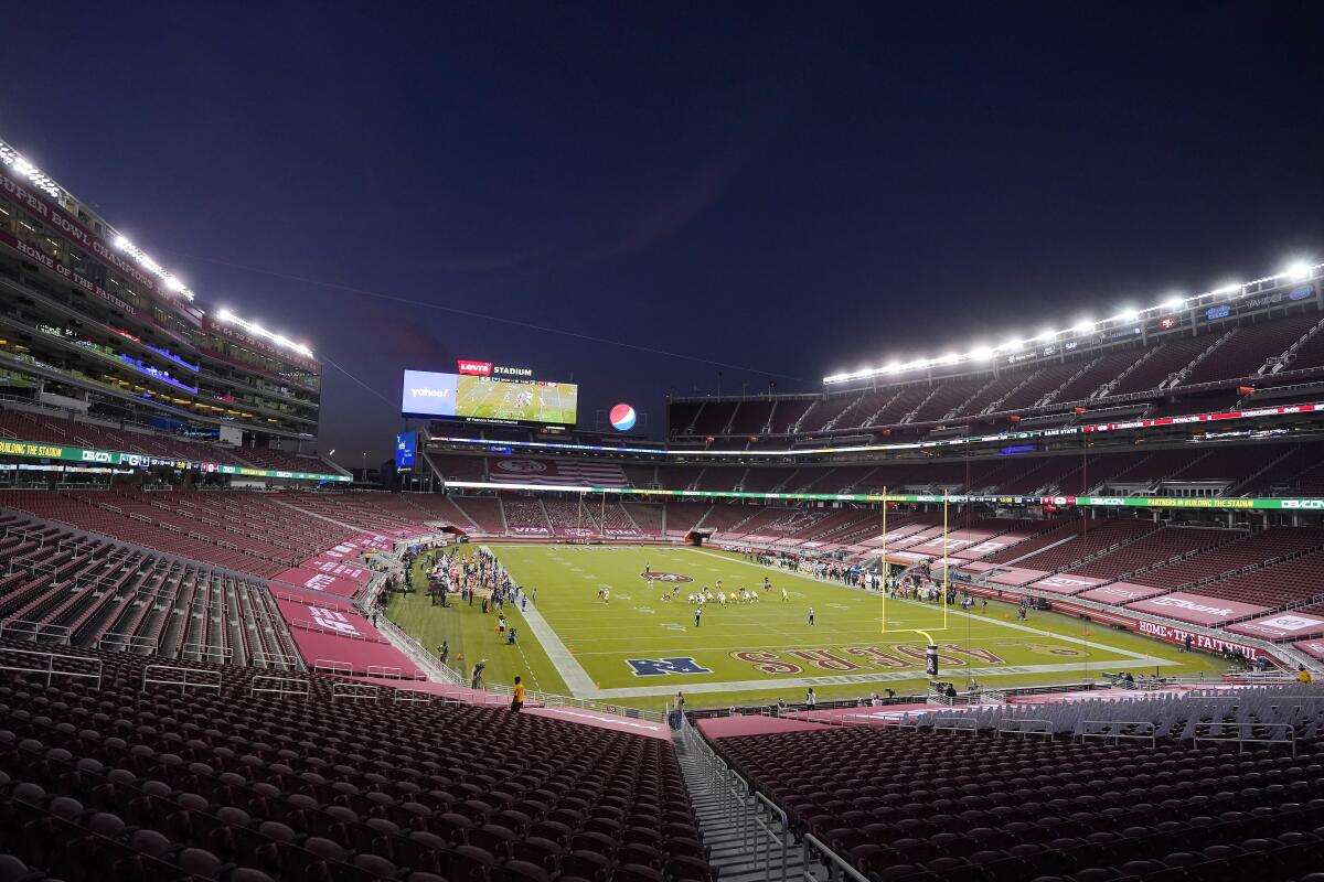 Empty seats at Levi's Stadium are shown during the first half of an NFL football game between the San Francisco 49ers and the Green Bay Packers in Santa Clara, Calif., Thursday, Nov. 5, 2020. (AP Photo/Jeff Chiu)