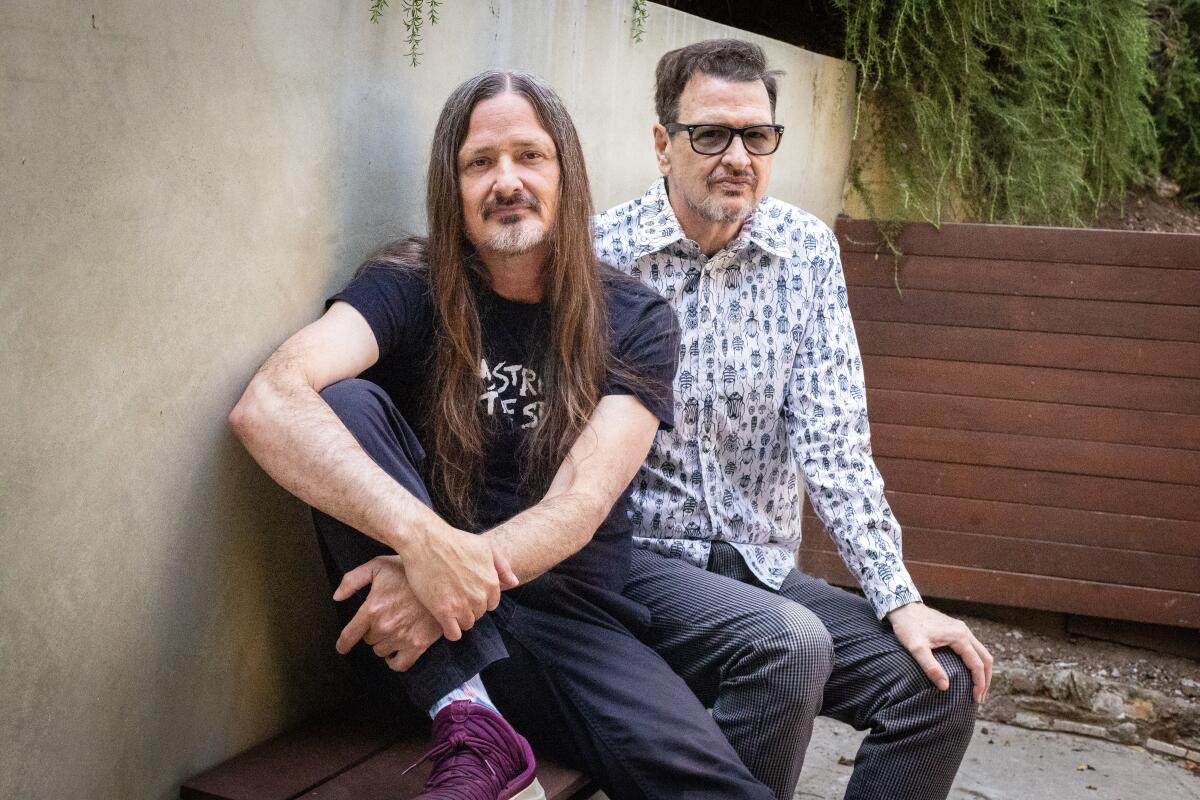Twin brothers Jeff, right, and Steve McDonald of the band Redd Kross pose for a portrait 