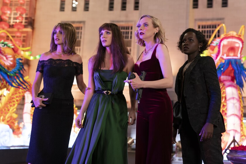 This image provided by Universal Pictures shows Penelope Cruz as Graciela, Jessica Chastain as Mason "Mace" Brown, Diane Kruger as Marie and Lupita Nyong'o as Khadijah in a scene from "The 355," co-written and directed by Simon Kinberg. (Universal Pictures via AP)