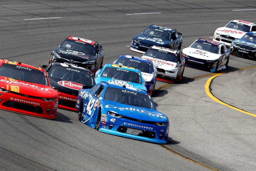 RICHMOND, VA - APRIL 29: Kyle Larson, driver of the #42 Credit One Bank Chevrolet, and Justin Allgaier, driver of the #7 BRANDT Chevrolet, leads a pack of cars during the NASCAR XFINITY Series ToyotaCare 250 at Richmond International Raceway on April 29, 2017 in Richmond, Virginia. (Photo by Brian Lawdermilk/Getty Images) ** OUTS - ELSENT, FPG, CM - OUTS * NM, PH, VA if sourced by CT, LA or MoD **